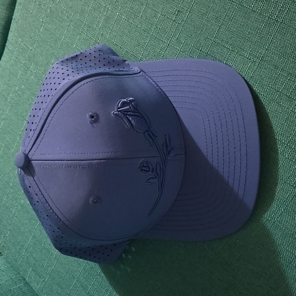 NWOT light blue baseball cap with embroidered beautiful blue Rose.